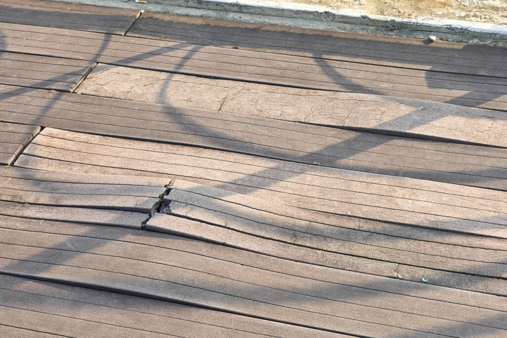 buckled deck boards